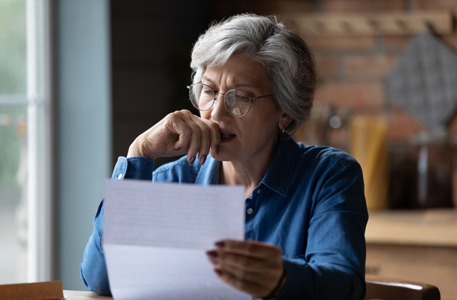 A woman with dementia undergoes a cognitive assessment to determine her capacity for making decisions independently.